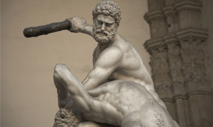 Masculine Hercules fighting a liberal